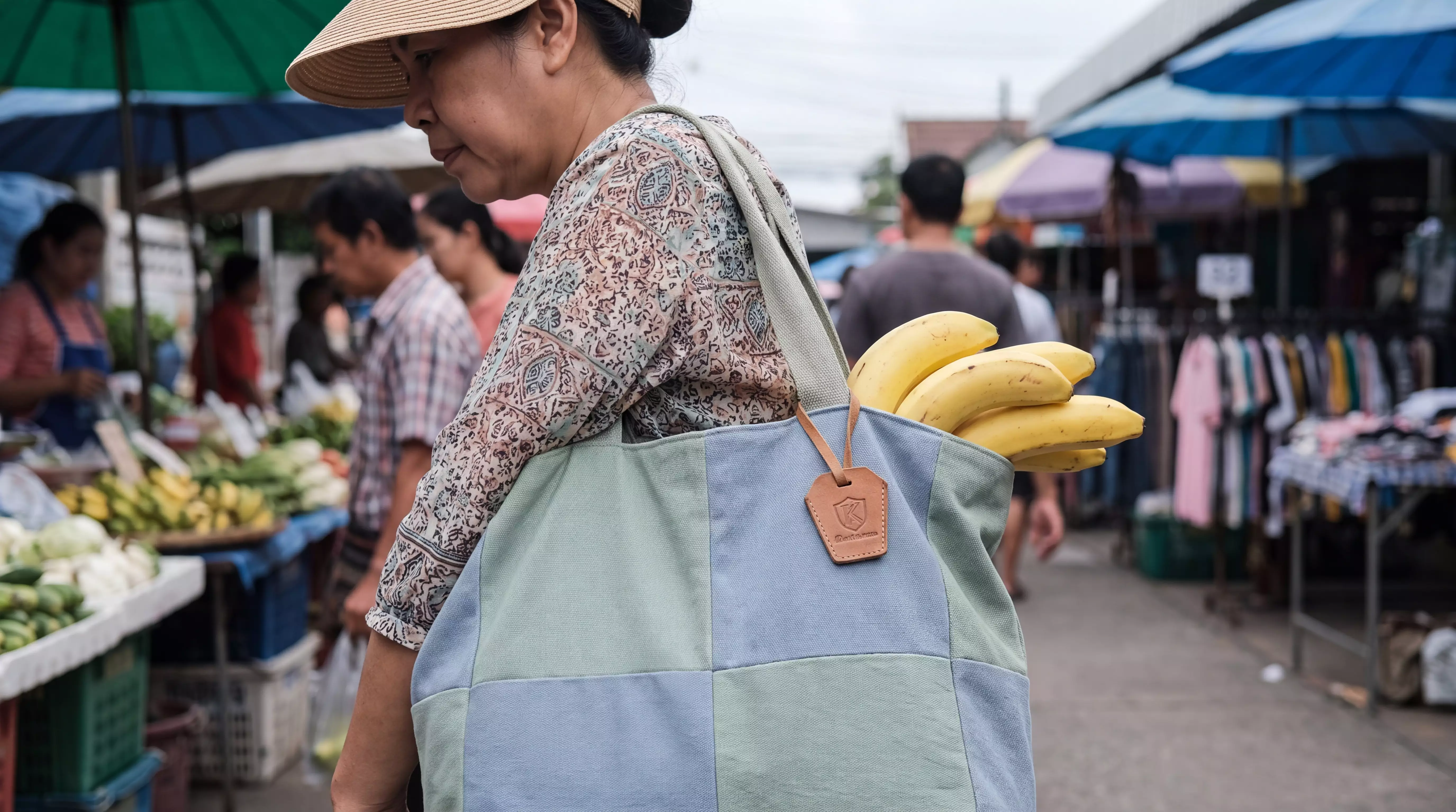 Woman carrying a pastel tote bag